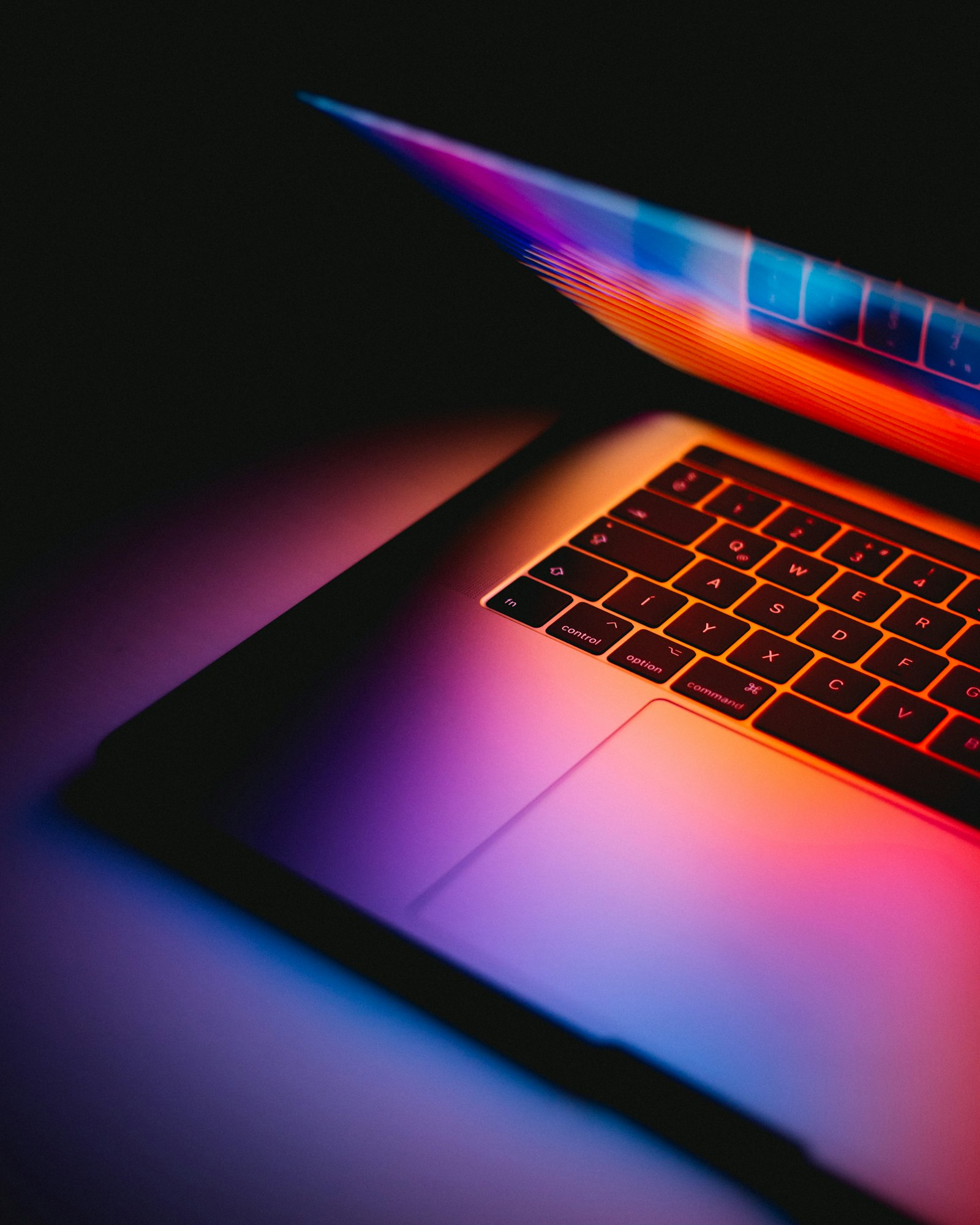 Photo editing on a laptop screen showing color grading interface