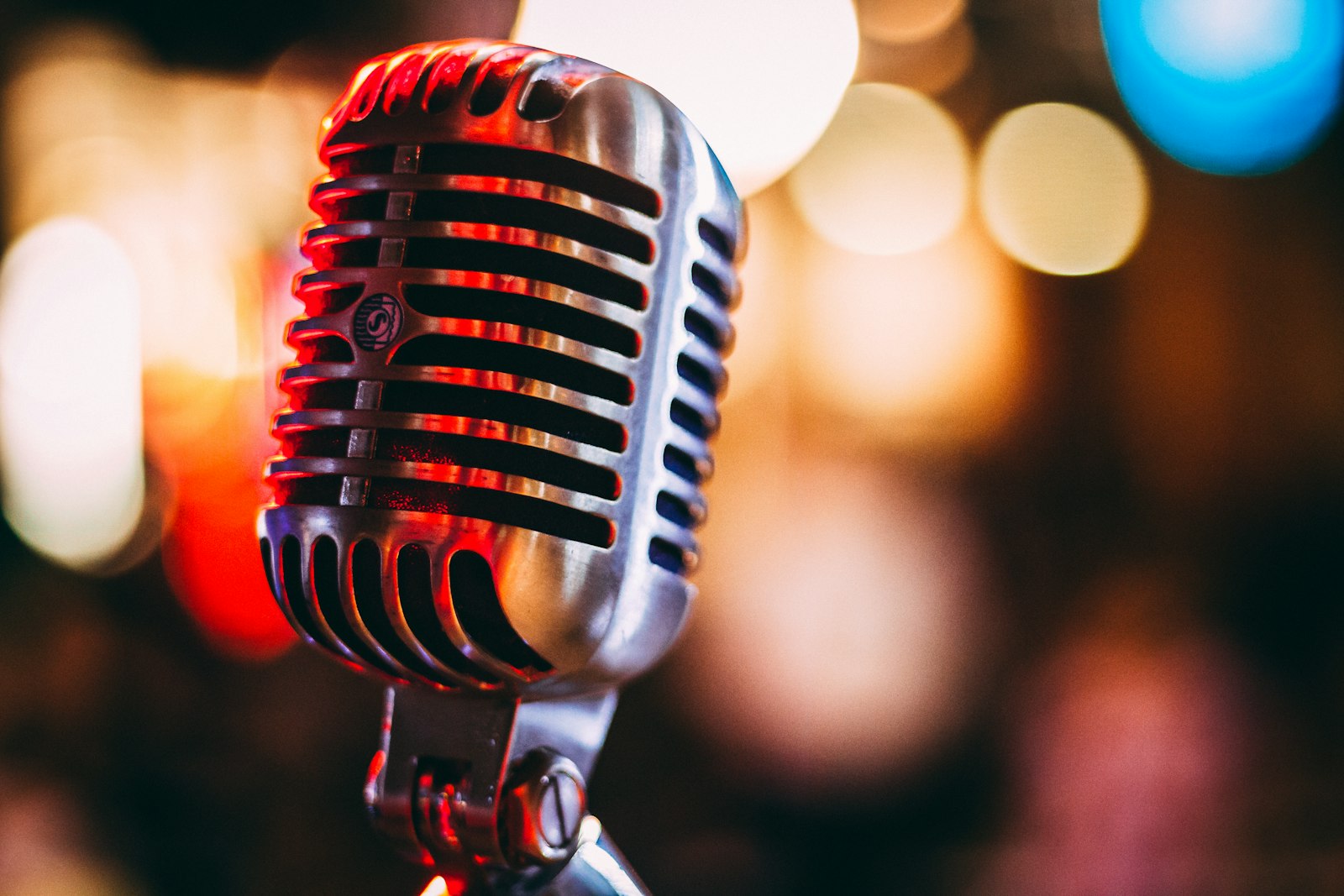 Professional condenser microphone in a recording studio used for AI voice generation and cloning