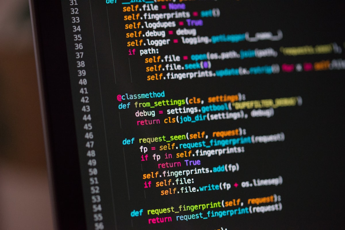 Terminal and editor lit by warm screen glow