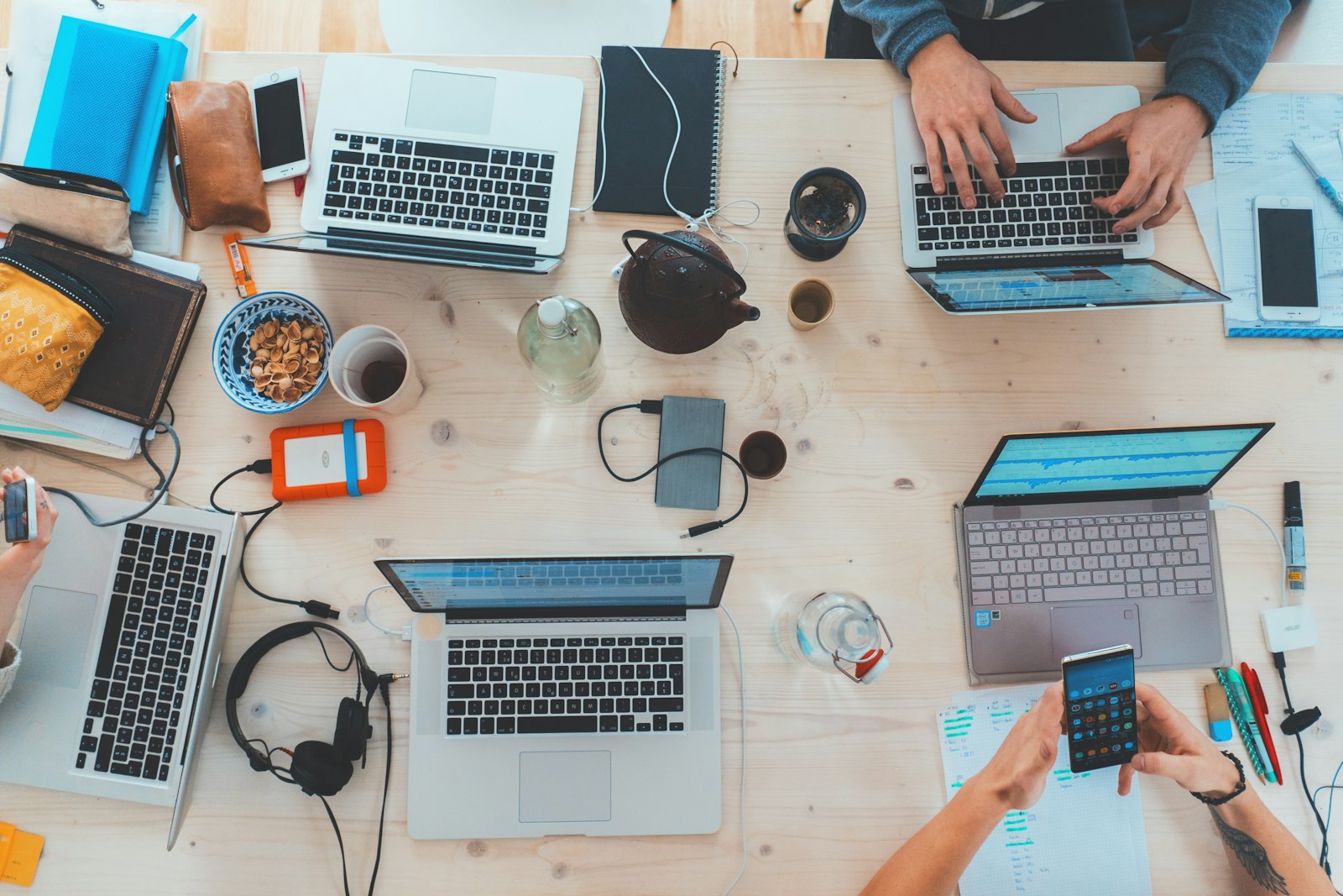 Person using a laptop at a clean modern desk