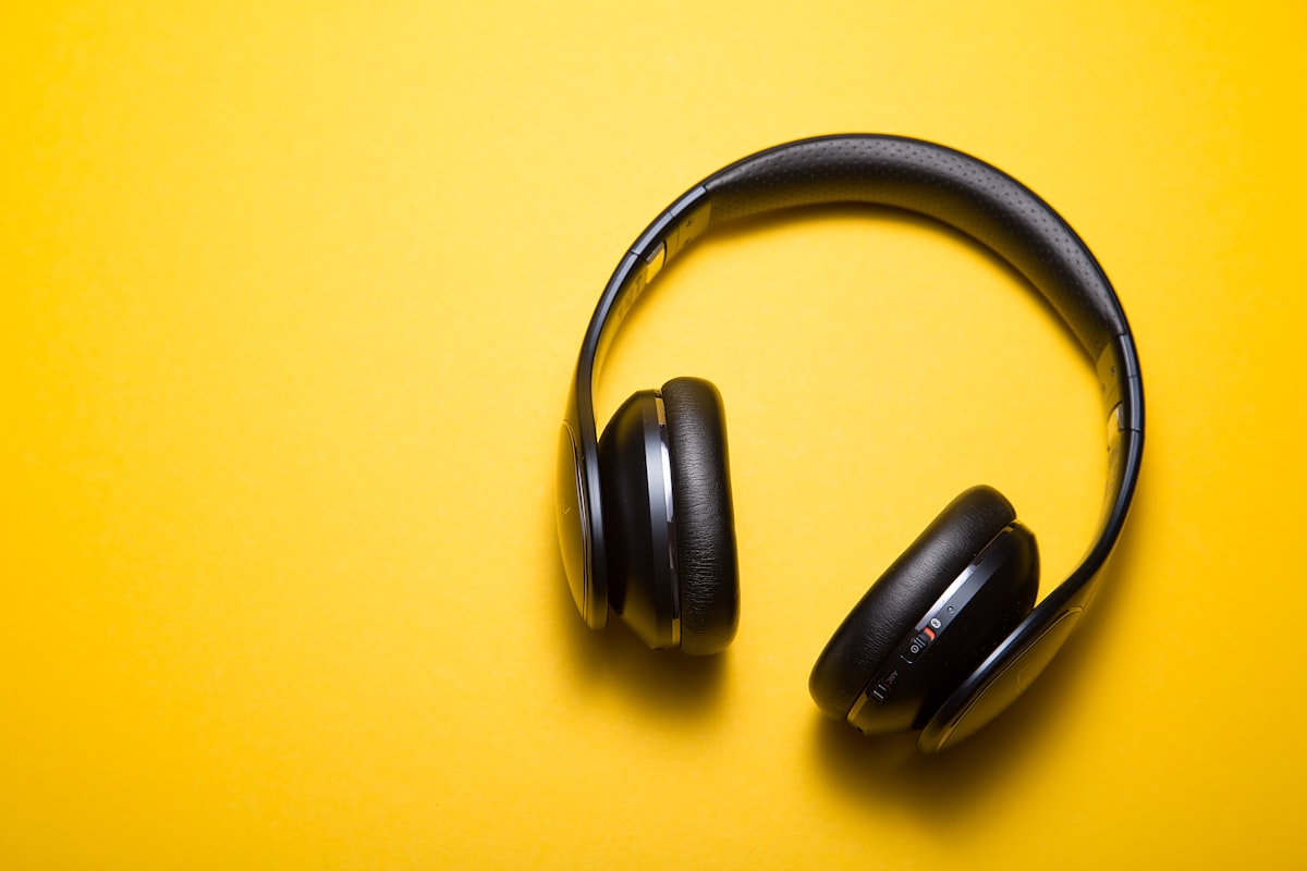 Studio headphones resting on a console