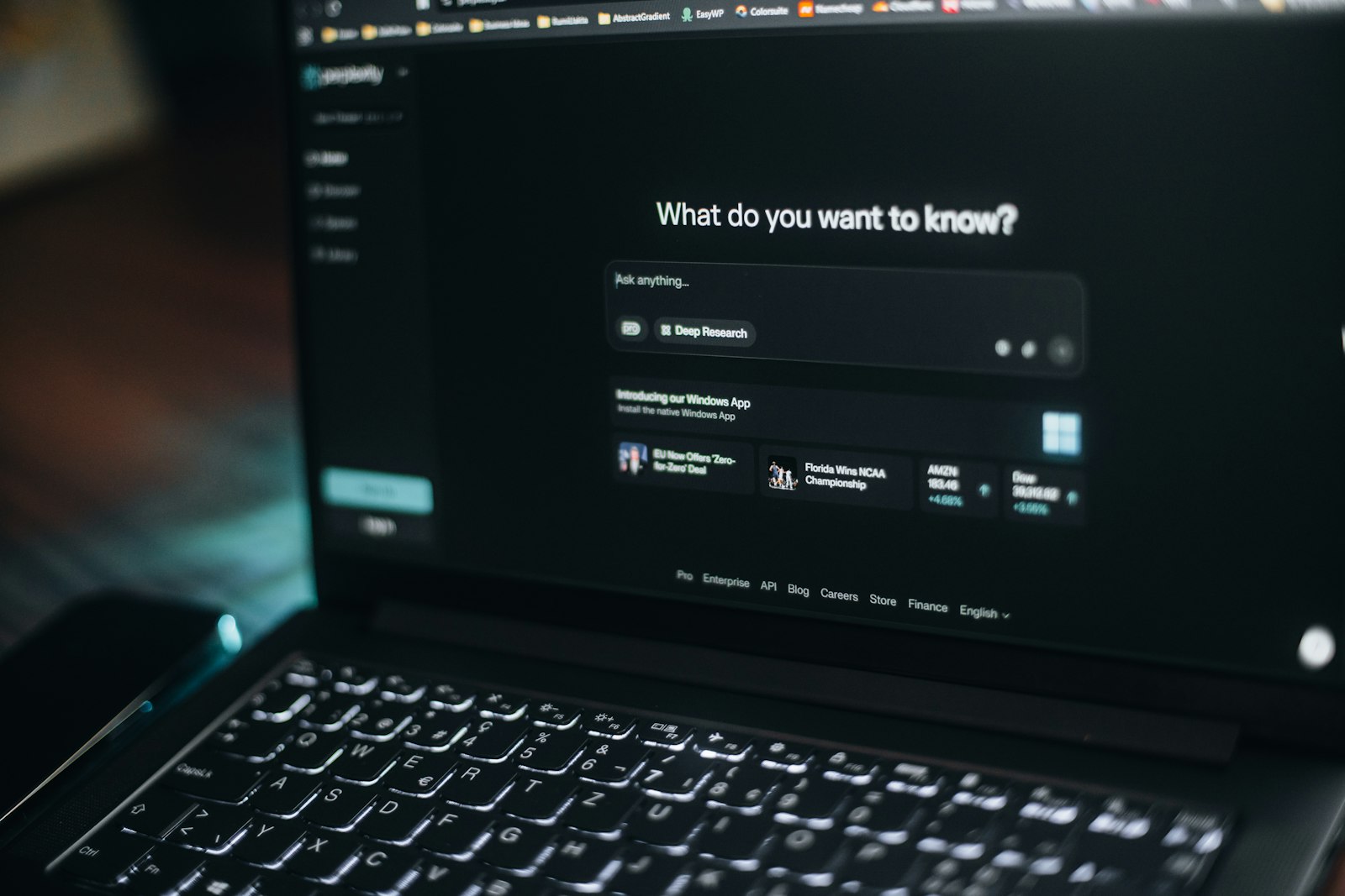 AI assistant interface open on a laptop screen showing a chat-style prompt box